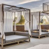 a patio with covered seating 