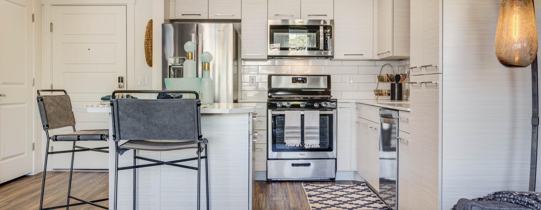 a kitchen with white cabinets