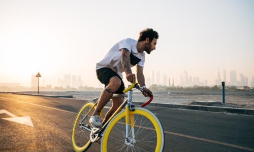 Find your perfect fit at Block 44 a man riding a bicycle on a road
