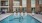a swimming pool in a brick building