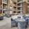 a courtyard with chairs and tables